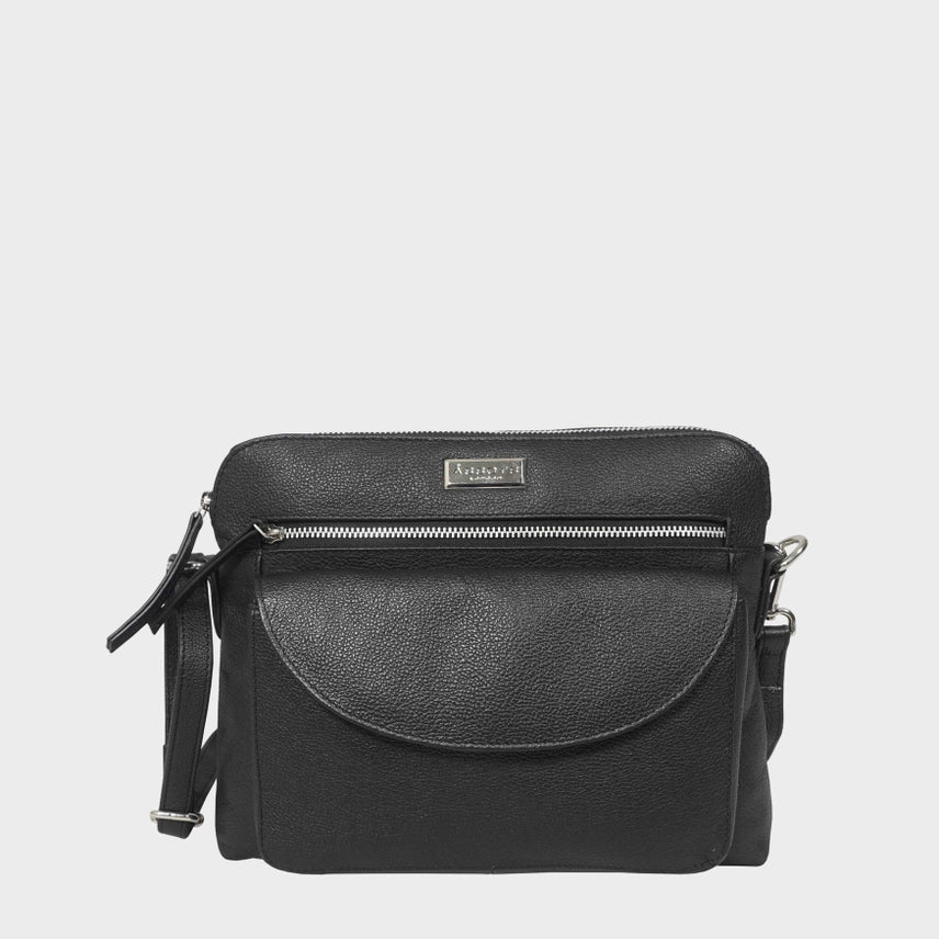 Black pebble-grain genuine leather crossbody bag with zip compartment and magnetic flap closure.