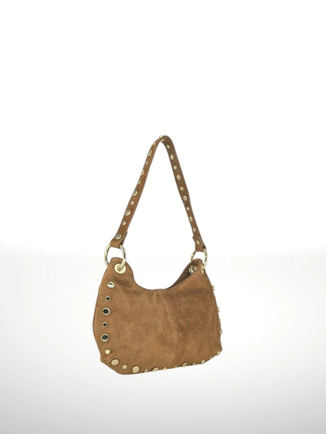 
Neutral Suede handbag with studs on a white background