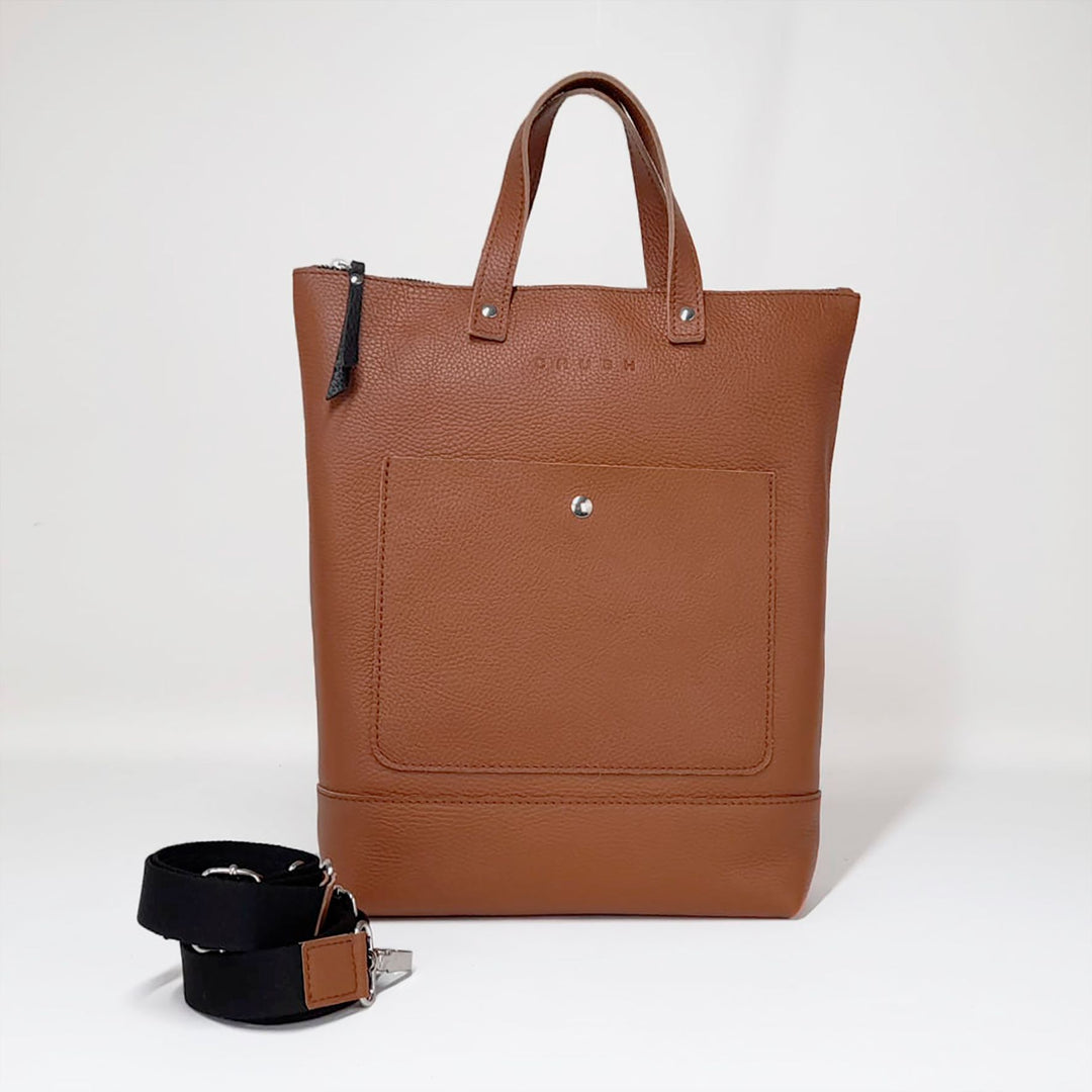 Front view of brown TONI convertible leather tote backpack in full-grain leather
