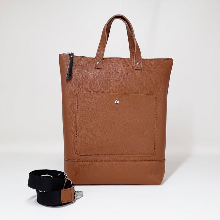 Front view of brown TONI convertible leather tote backpack in full-grain leather
