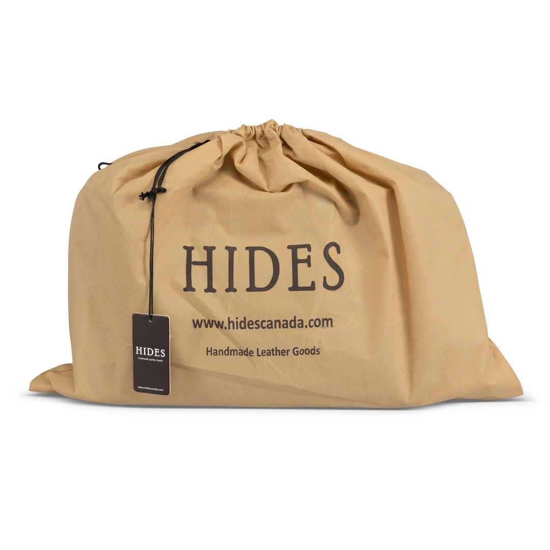 Beige drawstring bag with 'HIDES' branding on a white background