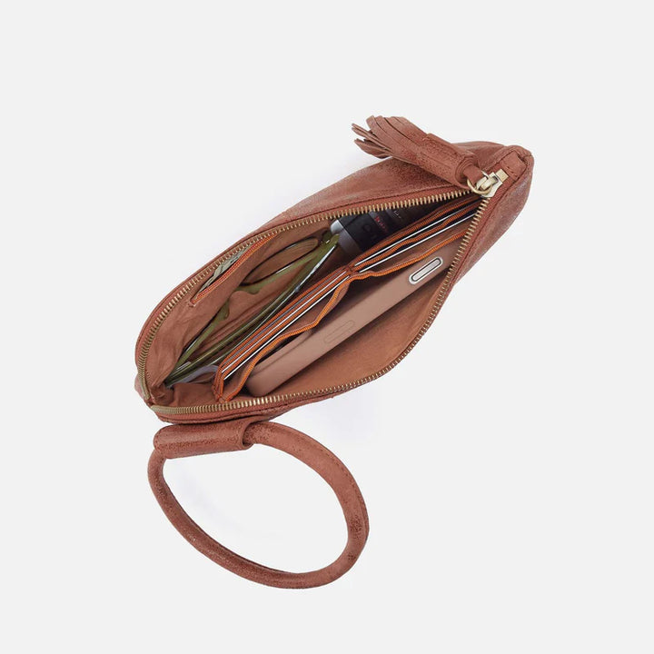 Top view of HOBO Sable Wristlet with zipper open and interior lining visible