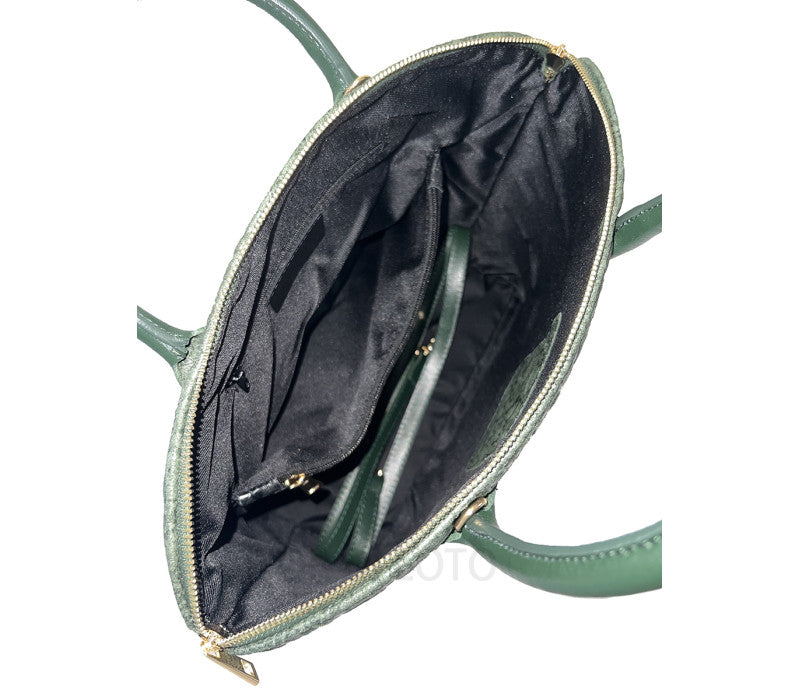 Interior view of Italian leather handbag showing spacious compartment and refined craftsmanship by Fior di Loto.