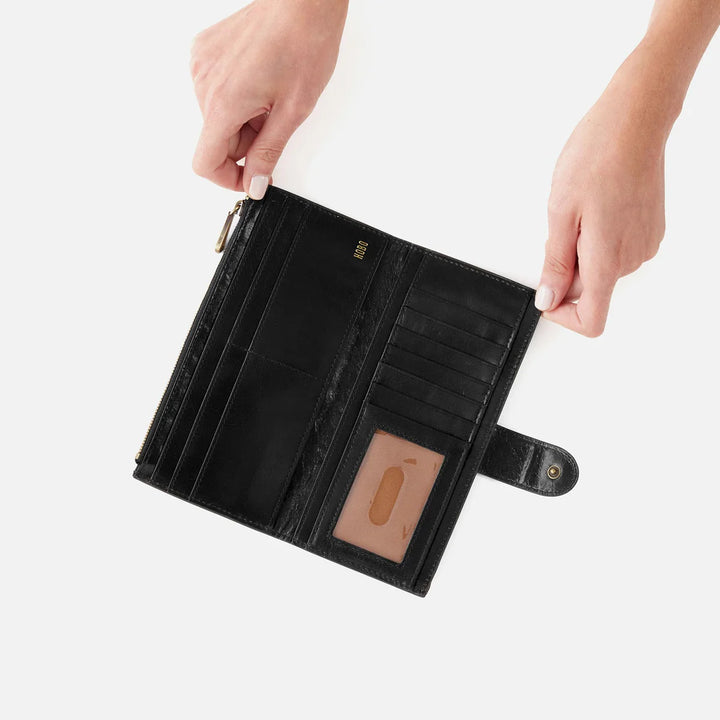 Interior of HOBO Dunn Continental Wallet with card slots and zippered coin pouch