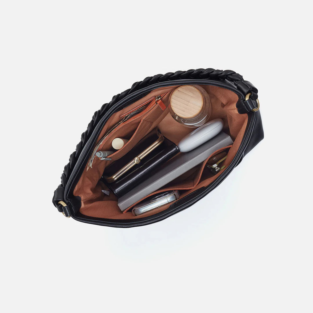 Interior view of HOBO Saddle Stardust shoulder bag showing spacious compartments