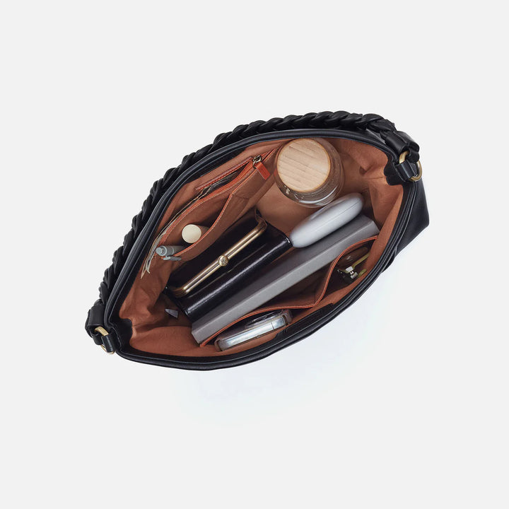 Interior view of HOBO Saddle Stardust shoulder bag showing spacious compartments