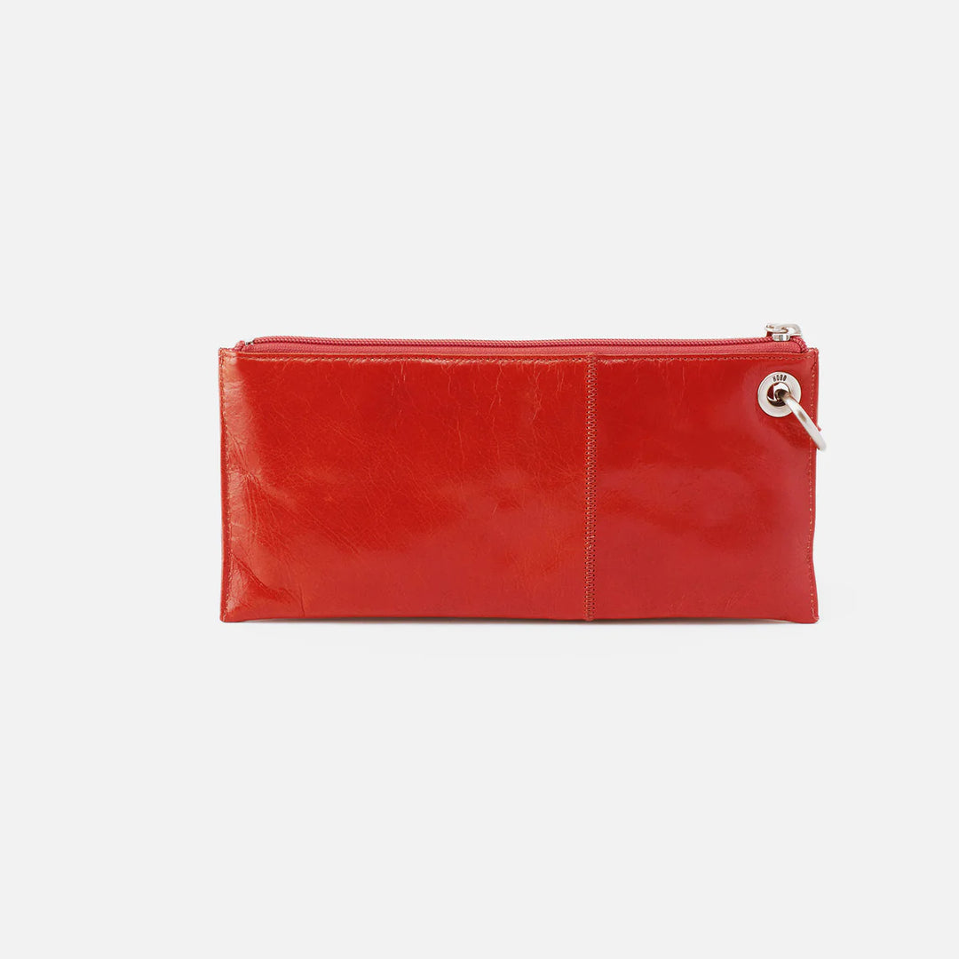 Back of HOBO Vida Wristlet in Grenadine polished leather, smooth finish with minimalist seam detail