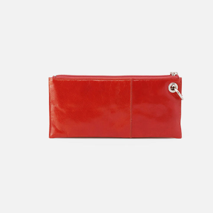Back of HOBO Vida Wristlet in Grenadine polished leather, smooth finish with minimalist seam detail